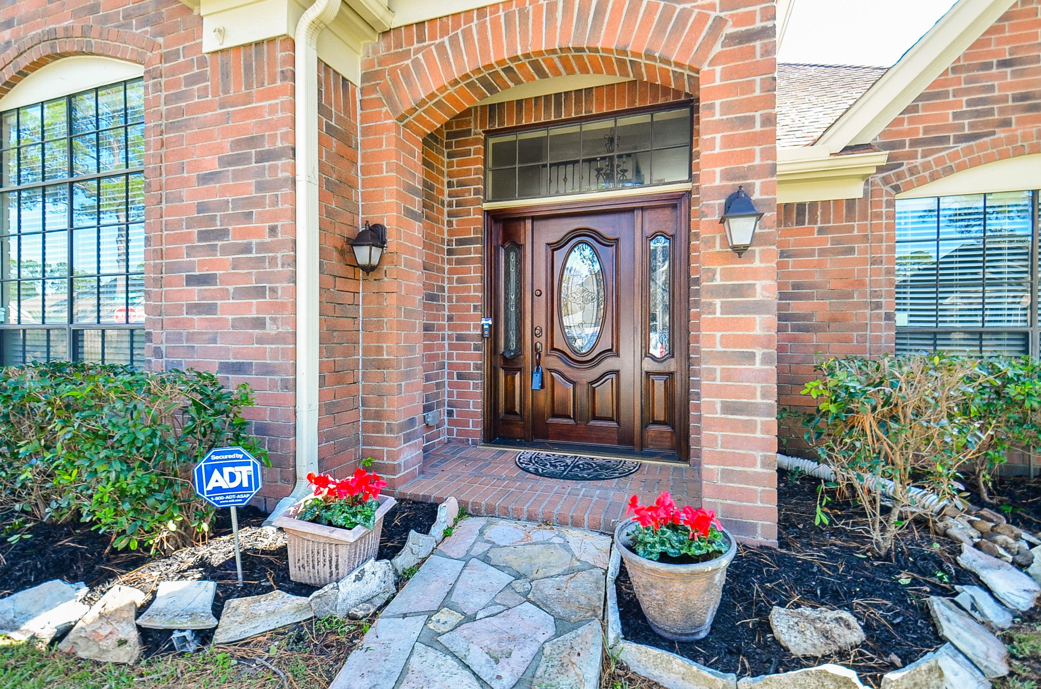 8803 Tweedbrook Drive Spring, TX 77379 - Photo 4 of 36 Check out this stylish arched entryway with a spacious, refinished fiberglass front door!