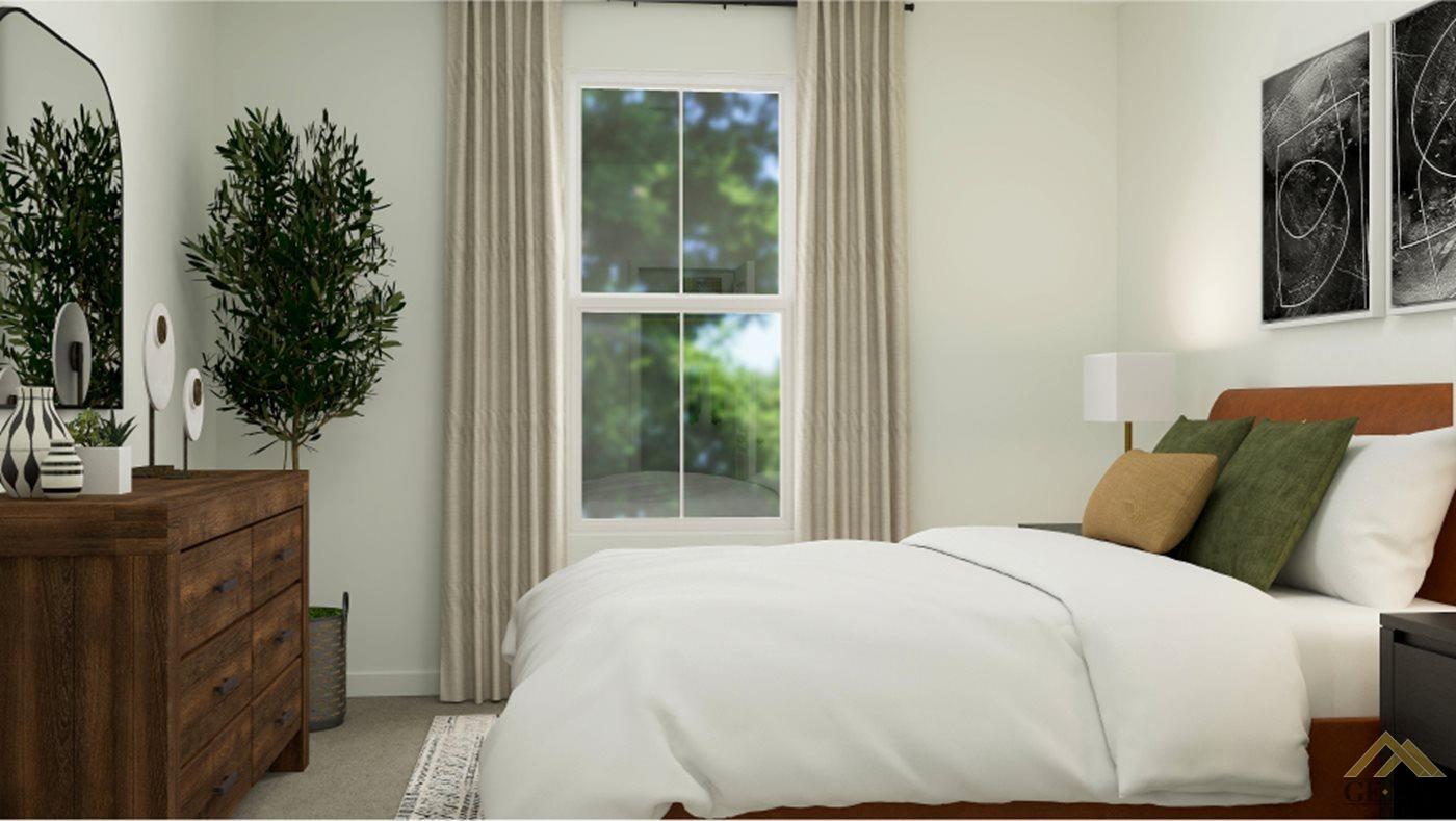 Undisclosed Address Shafter, CA 93263 - Photo 13 of 19 a bedroom with a large bed and a potted plant