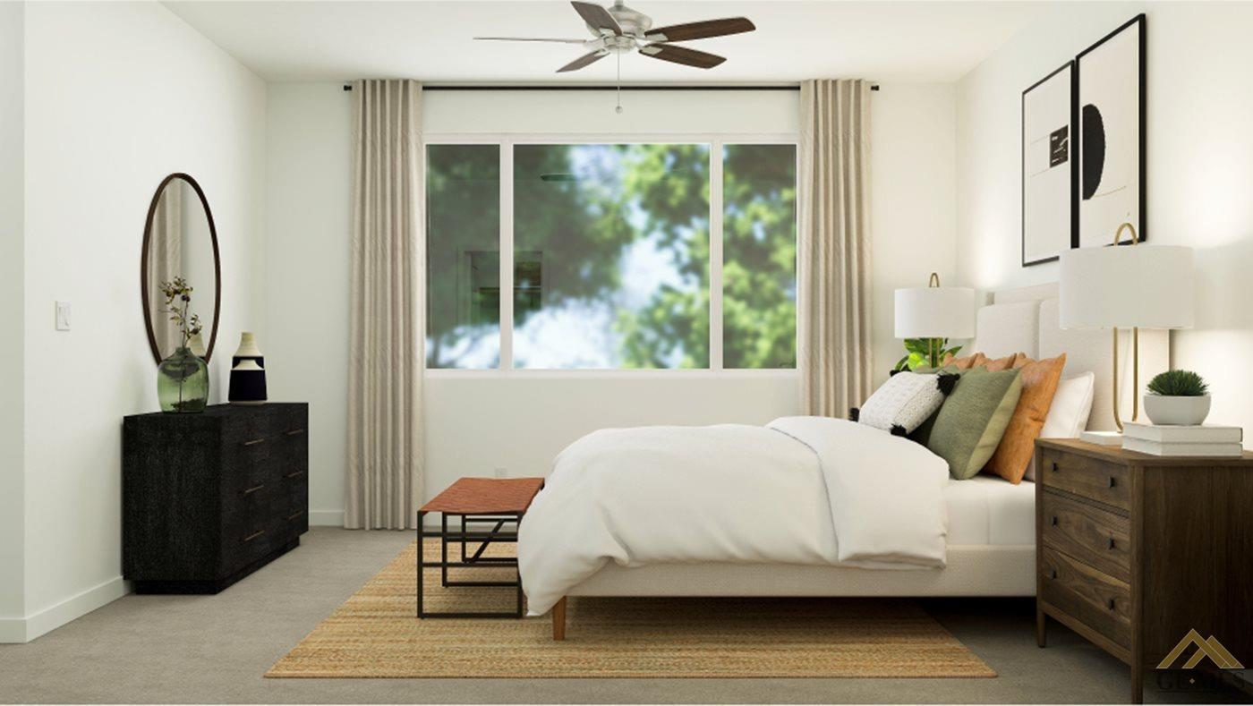 Undisclosed Address Shafter, CA 93263 - Photo 15 of 19 a bedroom with a bed a mirror and a large window with the outer view