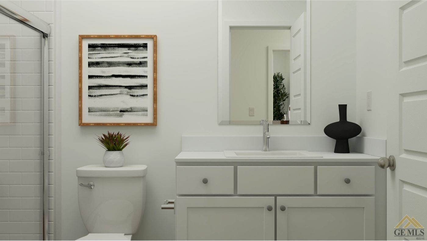 Undisclosed Address Shafter, CA 93263 - Photo 16 of 19 a bathroom with a sink and a mirror