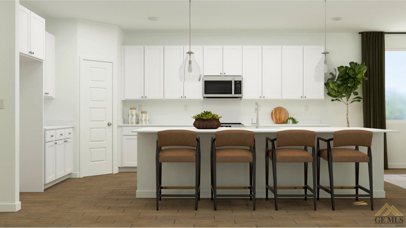 Undisclosed Address Shafter, CA 93263 - Photo 2 of 19 a kitchen with a table chairs refrigerator and microwave