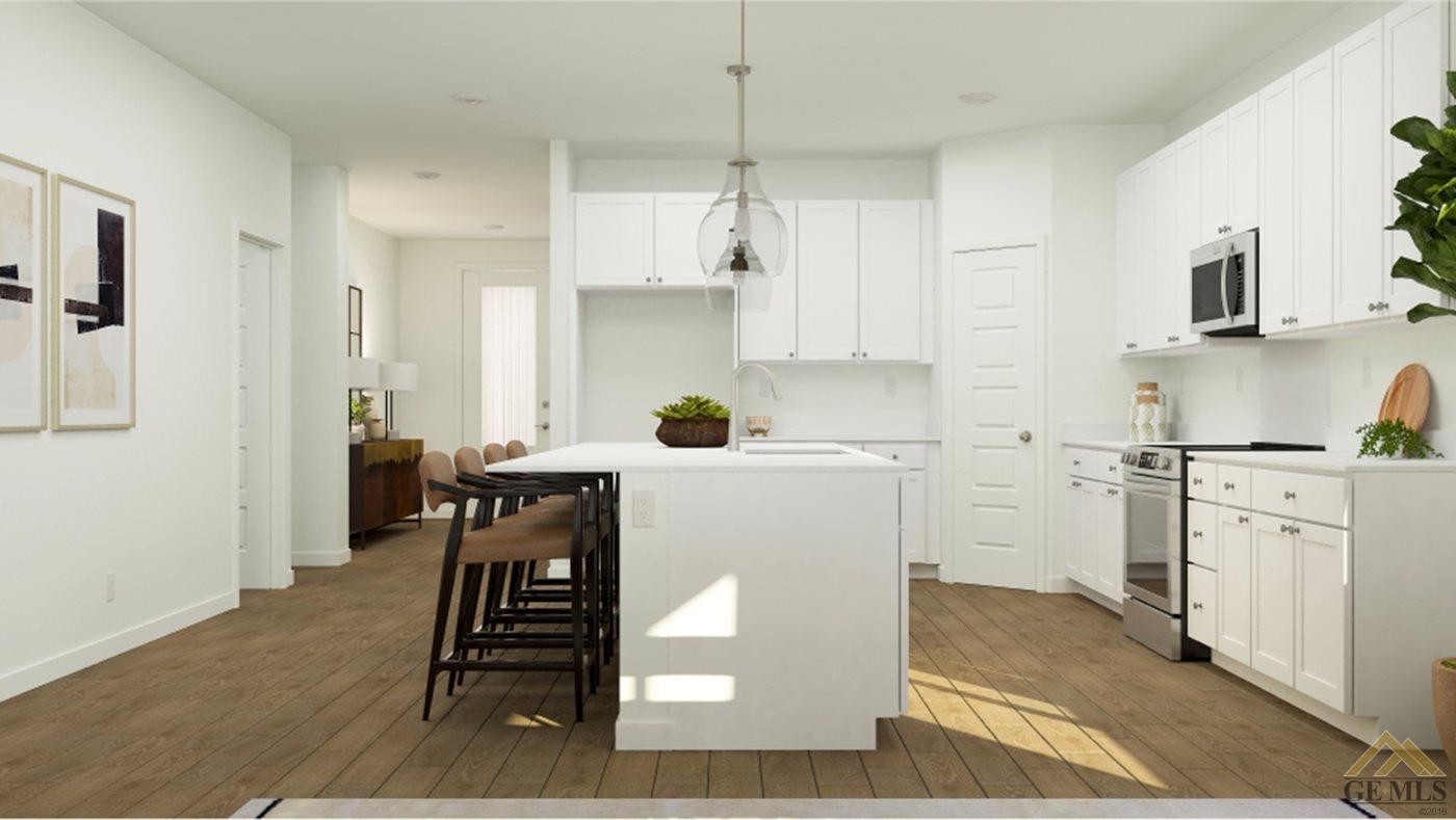 Undisclosed Address Shafter, CA 93263 - Photo 3 of 19 a kitchen with white cabinets and white appliances