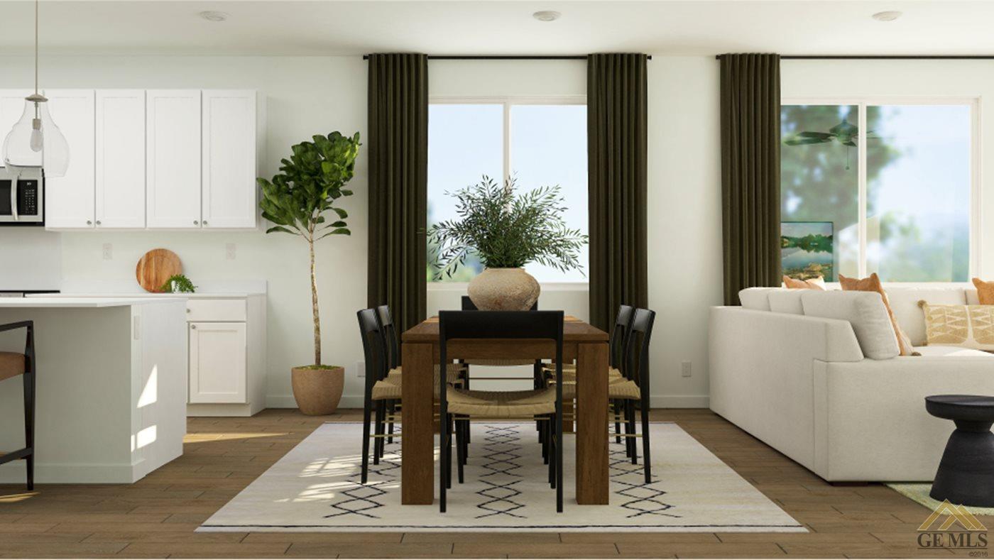 Undisclosed Address Shafter, CA 93263 - Photo 5 of 19 a living room with furniture and a potted plant