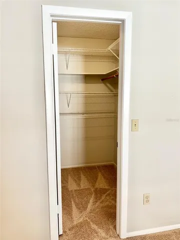 a bathroom with a glass door