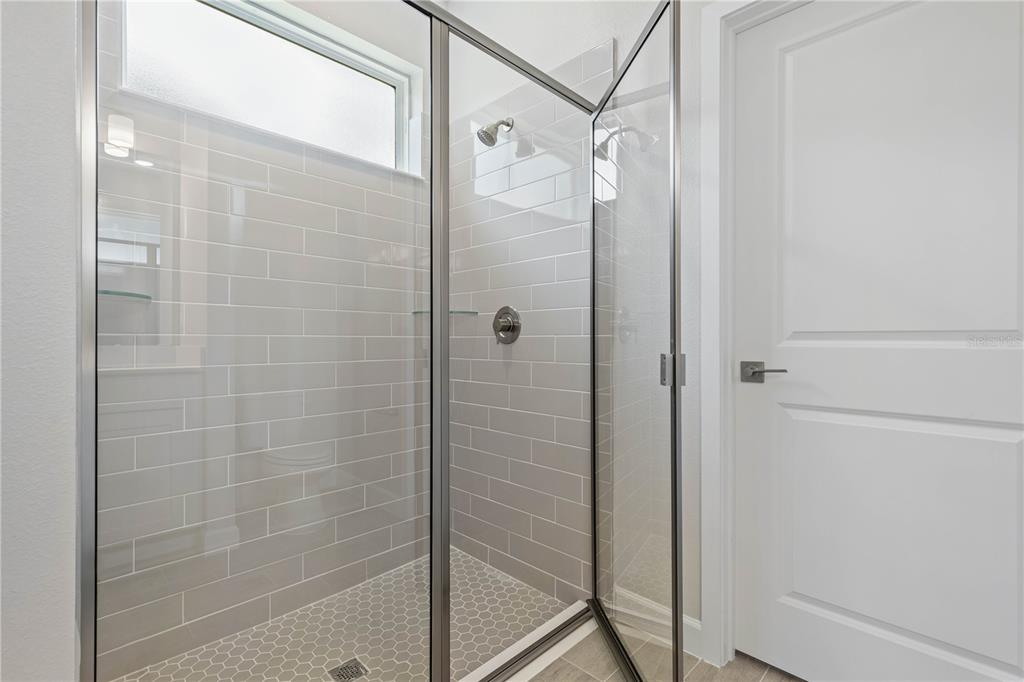 3294 Gowanda Road North Port, FL 34287 - Photo 19 of 28 a bathroom with a shower