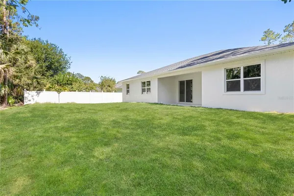 a house view with garden space
