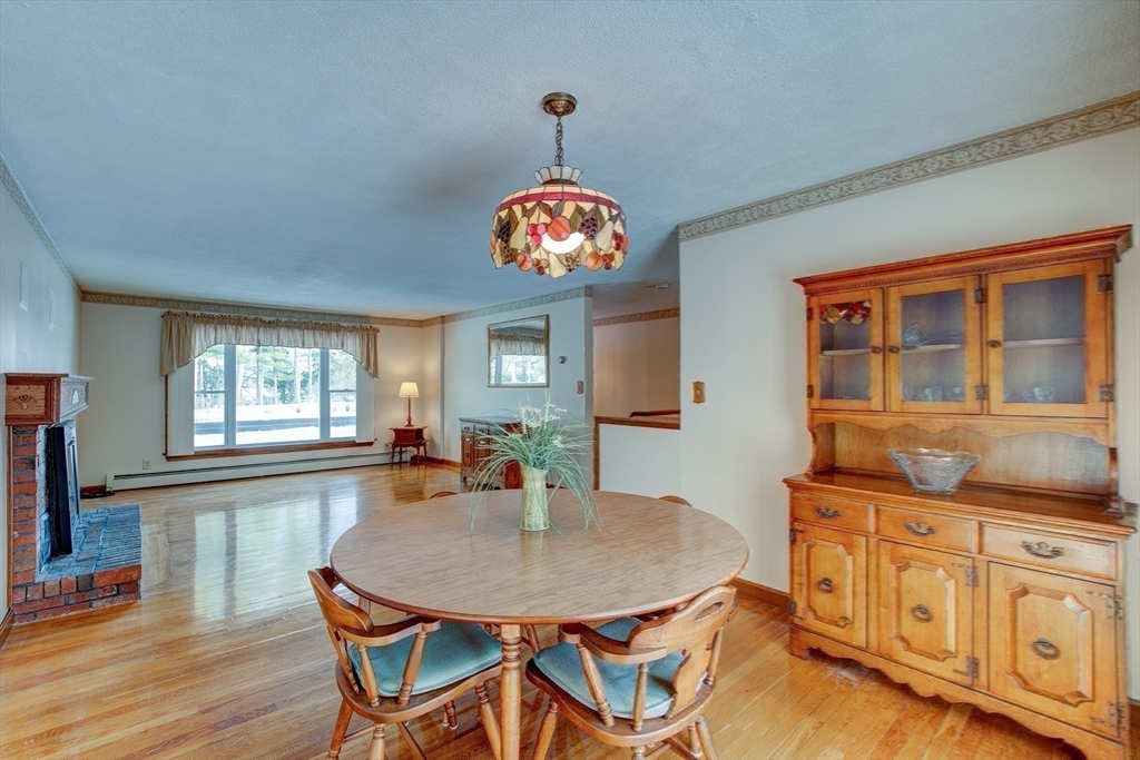 207 Sherbert Road Ashburnham, MA 01430 - Photo 12 of 41 a view of a dining room with furniture and window