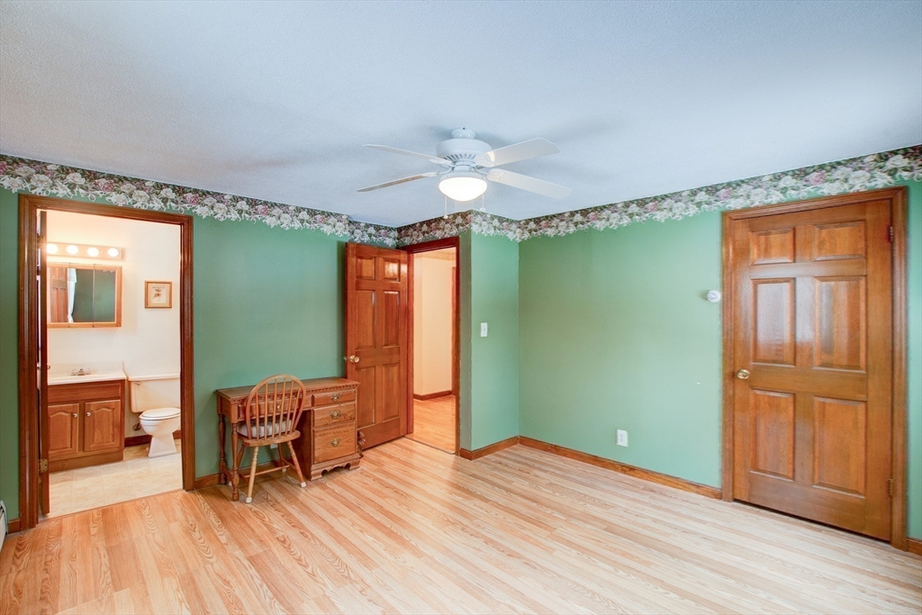 207 Sherbert Road Ashburnham, MA 01430 - Photo 20 of 41 a furnished livingroom with a window and wooden floor