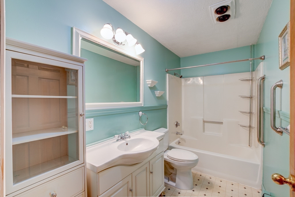 207 Sherbert Road Ashburnham, MA 01430 - Photo 23 of 41 a bathroom with a sink a toilet and shower