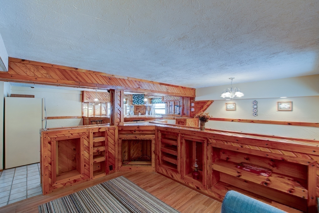 207 Sherbert Road Ashburnham, MA 01430 - Photo 28 of 41 a large kitchen with stainless steel appliances granite countertop a stove and a cabinets