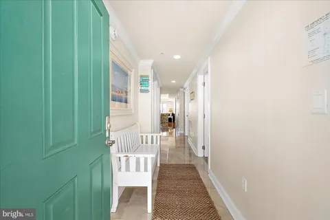 a view of a hallway with a green space