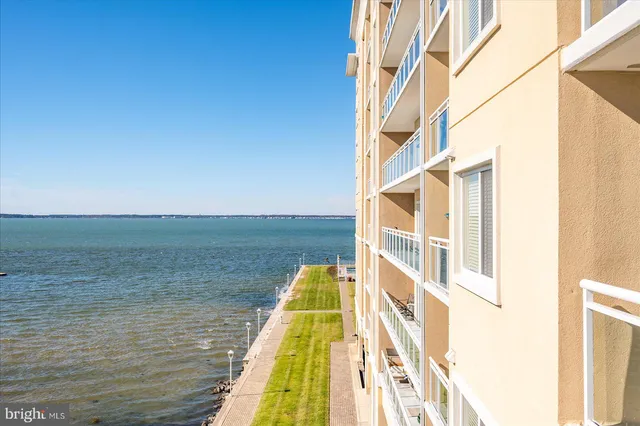 a view of swimming pool with a lake view