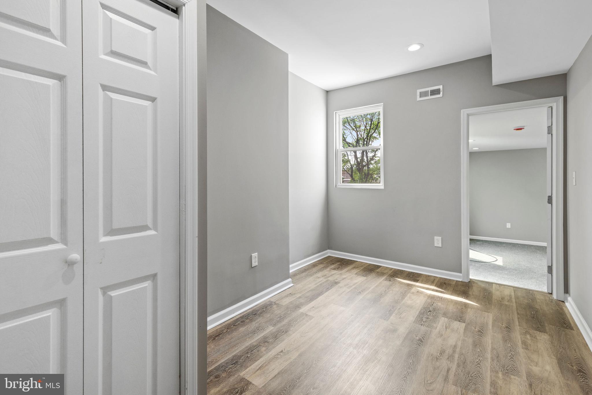 1809 West Lombard Street Baltimore, MD 21223 - Photo 16 of 36 a view of an empty room