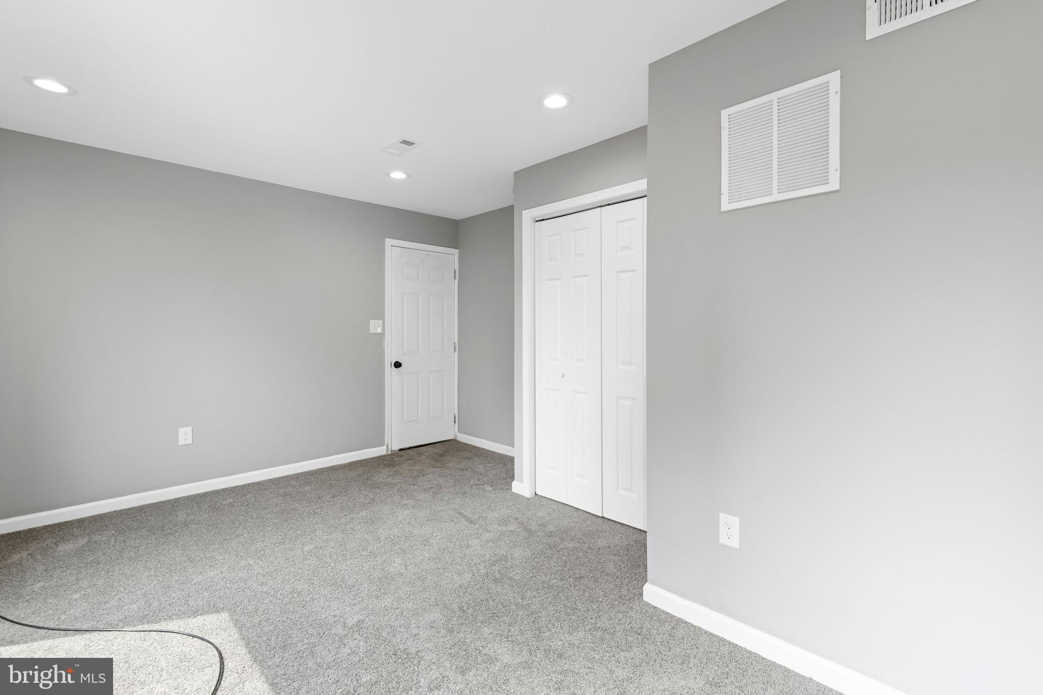 1809 West Lombard Street Baltimore, MD 21223 - Photo 19 of 36 a view of an empty room