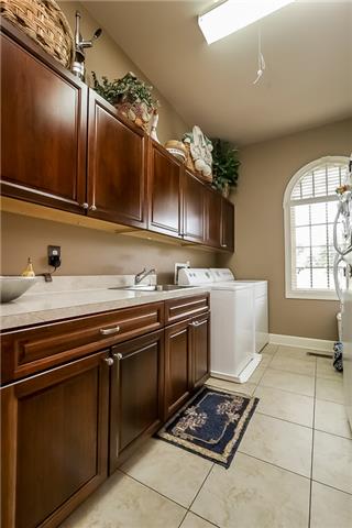 415 Ridgecrest Lane Lebanon, TN 37087 - Photo 11 of 20 Custom cabinets and tons of storage in the laundry room on the main level