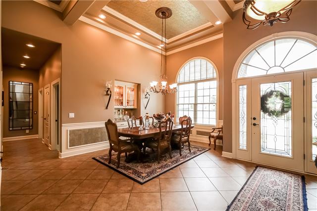 415 Ridgecrest Lane Lebanon, TN 37087 - Photo 3 of 20 Open dining room perfect for large or small gatherings with built in Kraftmaid cabinets for China Storage.