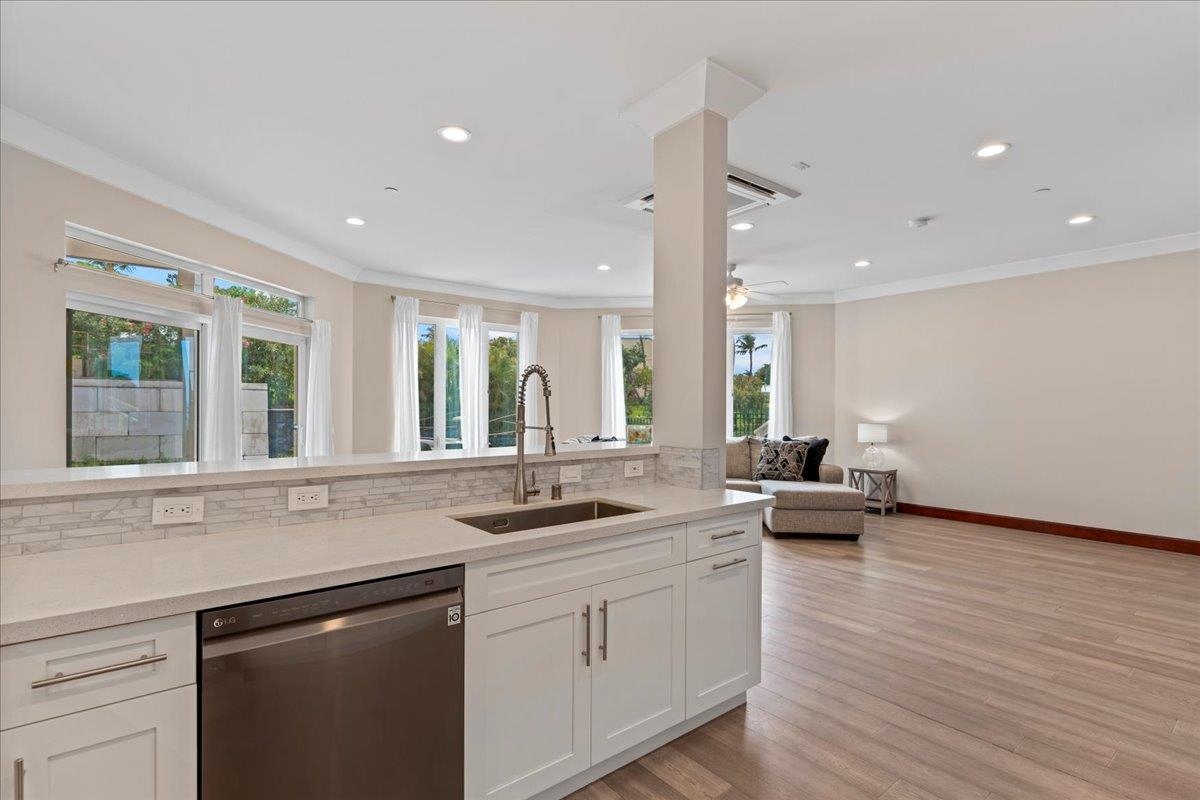 2757 South Kihei Road, Unit 801 Kihei, HI 96753 - Photo 18 of 41 a kitchen with sink attached with living room