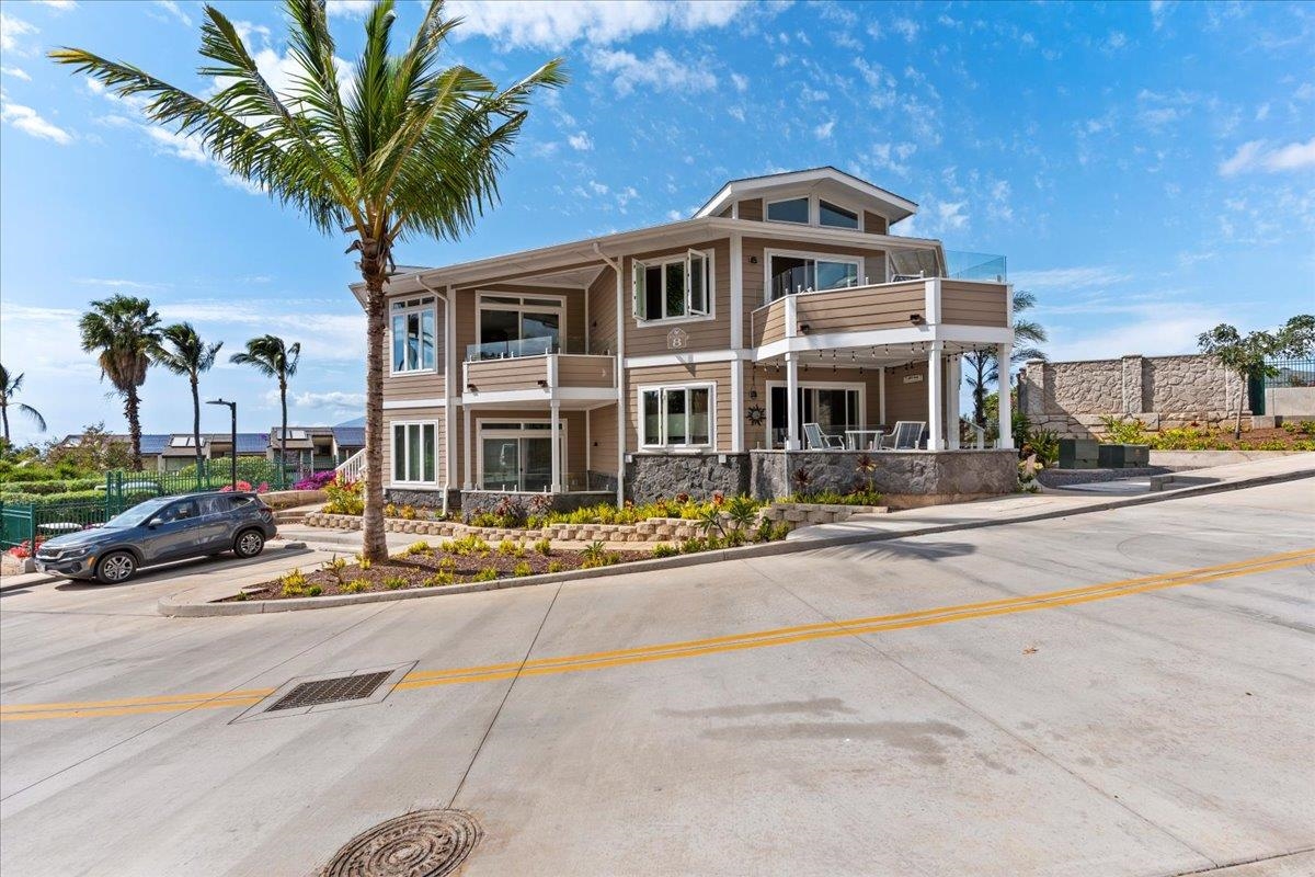 2757 South Kihei Road, Unit 801 Kihei, HI 96753 - Photo 2 of 41 a front view of a building with street view