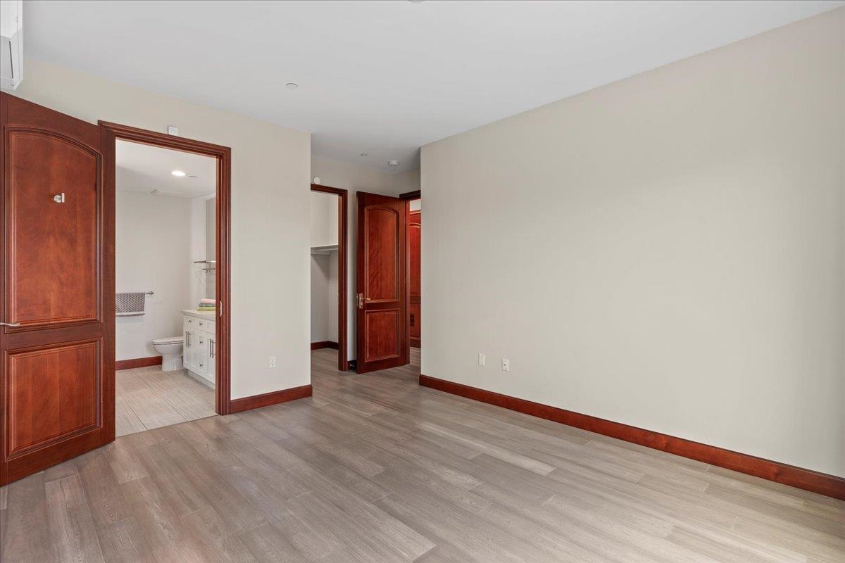 2757 South Kihei Road, Unit 801 Kihei, HI 96753 - Photo 26 of 41 a view of an empty room with kitchen and a window
