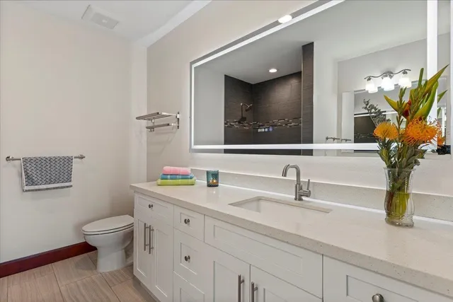 a bathroom with a bathtub and shower