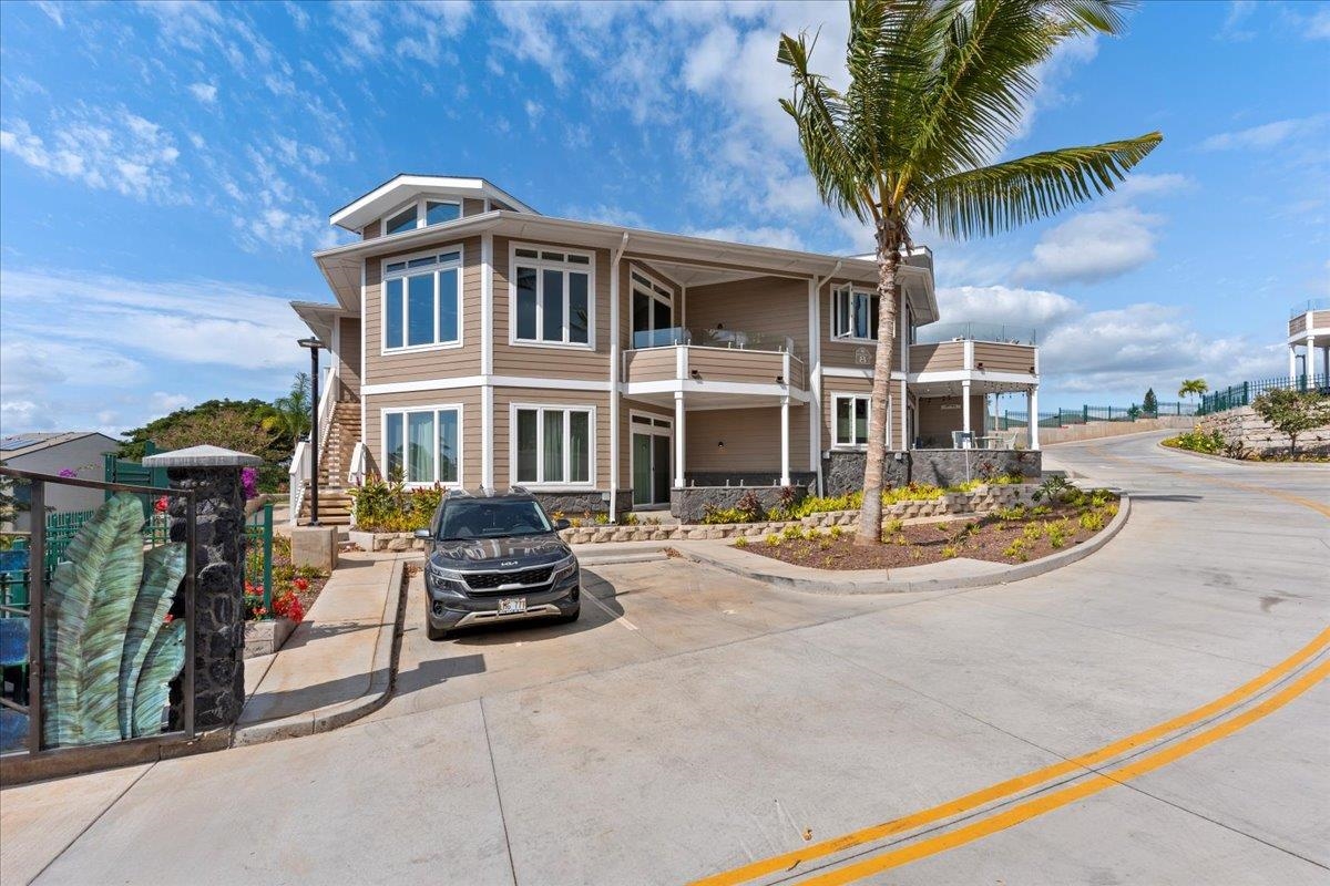 2757 South Kihei Road, Unit 801 Kihei, HI 96753 - Photo 3 of 41 a front view of a house with sitting area