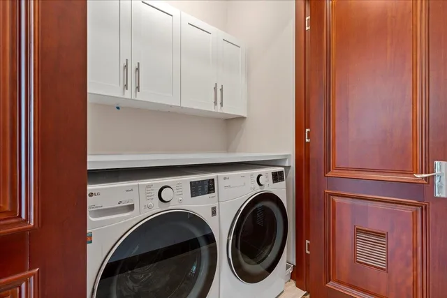 an empty room with wooden floor and closet