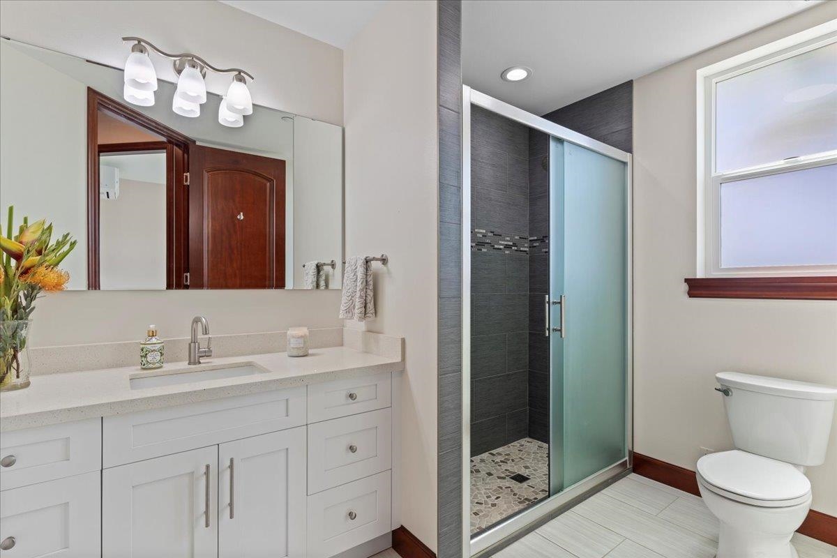 2757 South Kihei Road, Unit 801 Kihei, HI 96753 - Photo 37 of 41 a bathroom with a sink a toilet and shower