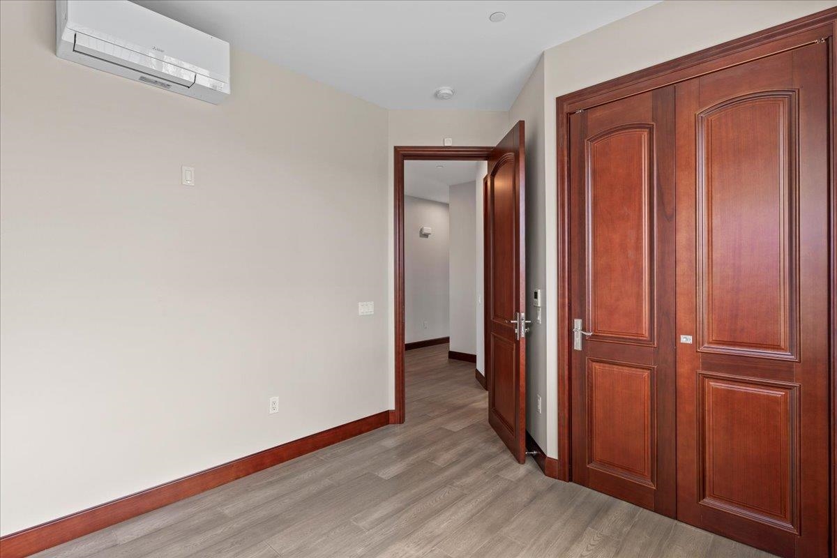 2757 South Kihei Road, Unit 801 Kihei, HI 96753 - Photo 41 of 41 an empty room with wooden floor and closet