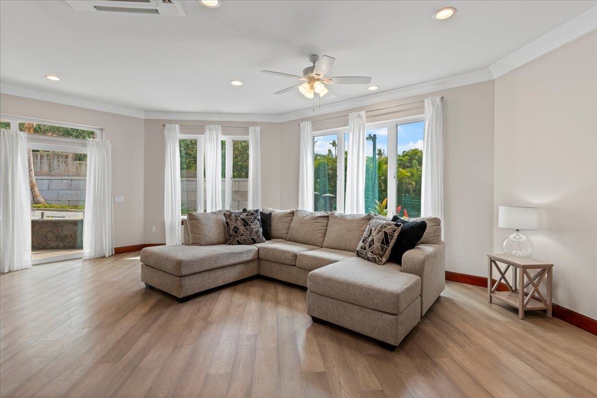2757 South Kihei Road, Unit 801 Kihei, HI 96753 - Photo 5 of 41 a living room with furniture and a large window