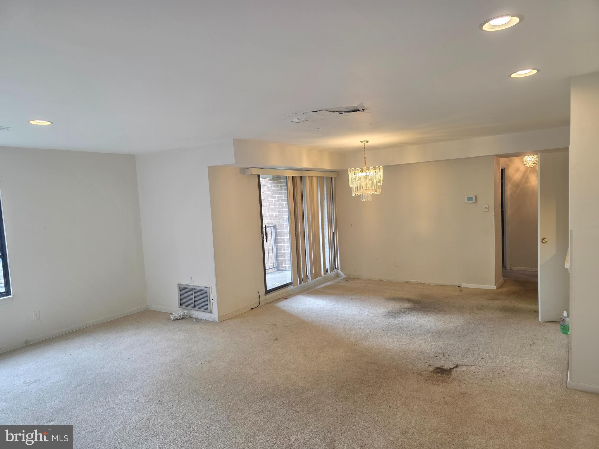 6317 Park Heights Avenue, Unit 103 Baltimore, MD 21215 - Photo 2 of 10 a view of an empty room