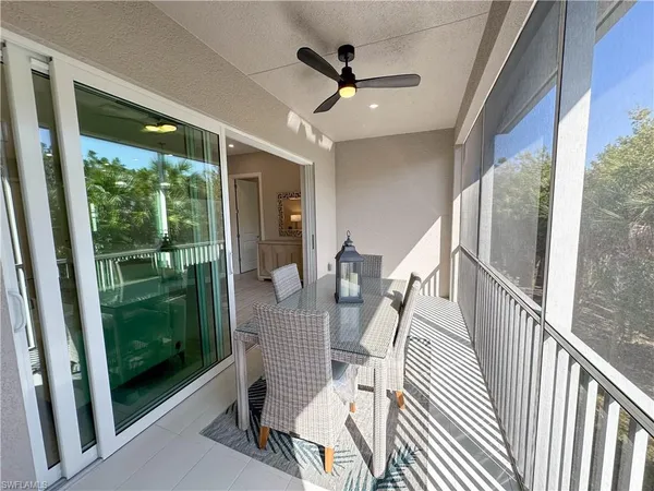 a view of balcony with furniture