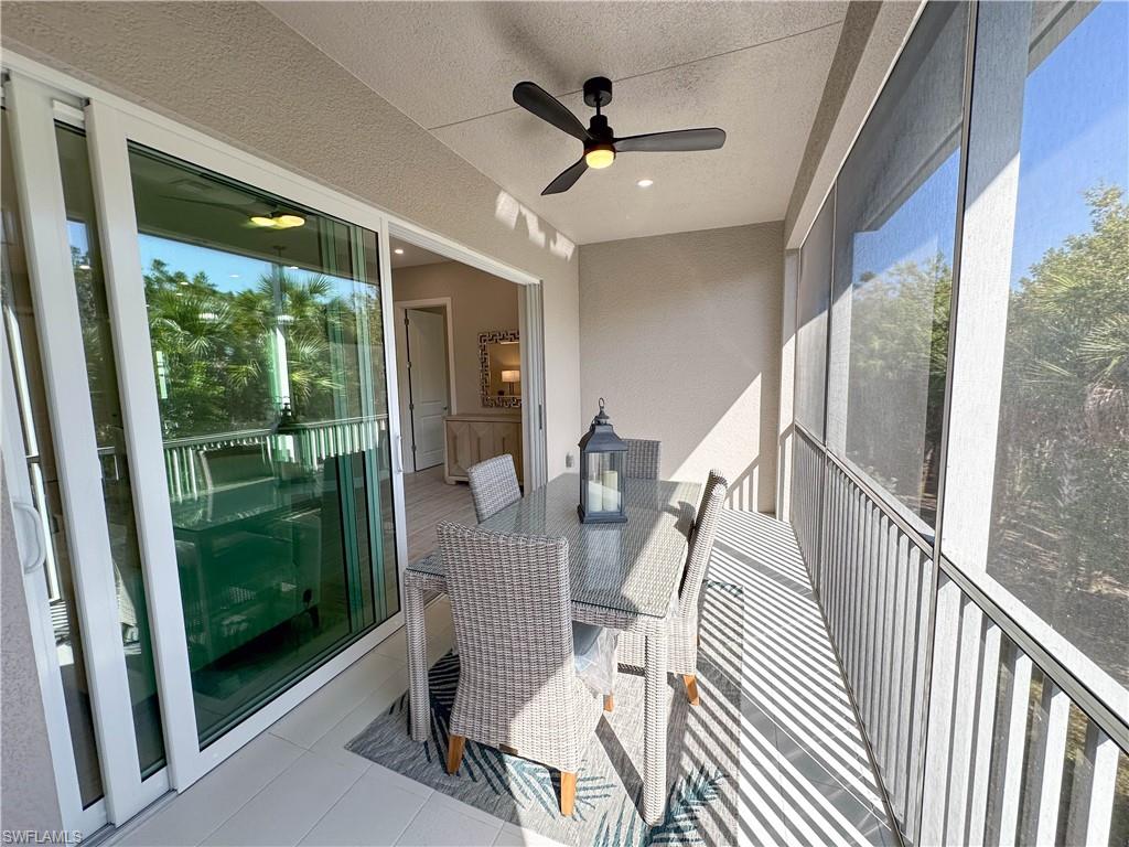 262 Indies Drive East, Unit 201 Naples, FL 34114 - Photo 15 of 45 a view of balcony with furniture