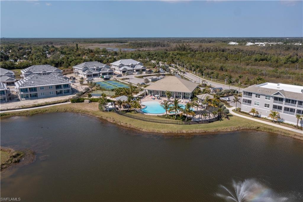 262 Indies Drive East, Unit 201 Naples, FL 34114 - Photo 42 of 45 a view of a ocean with city