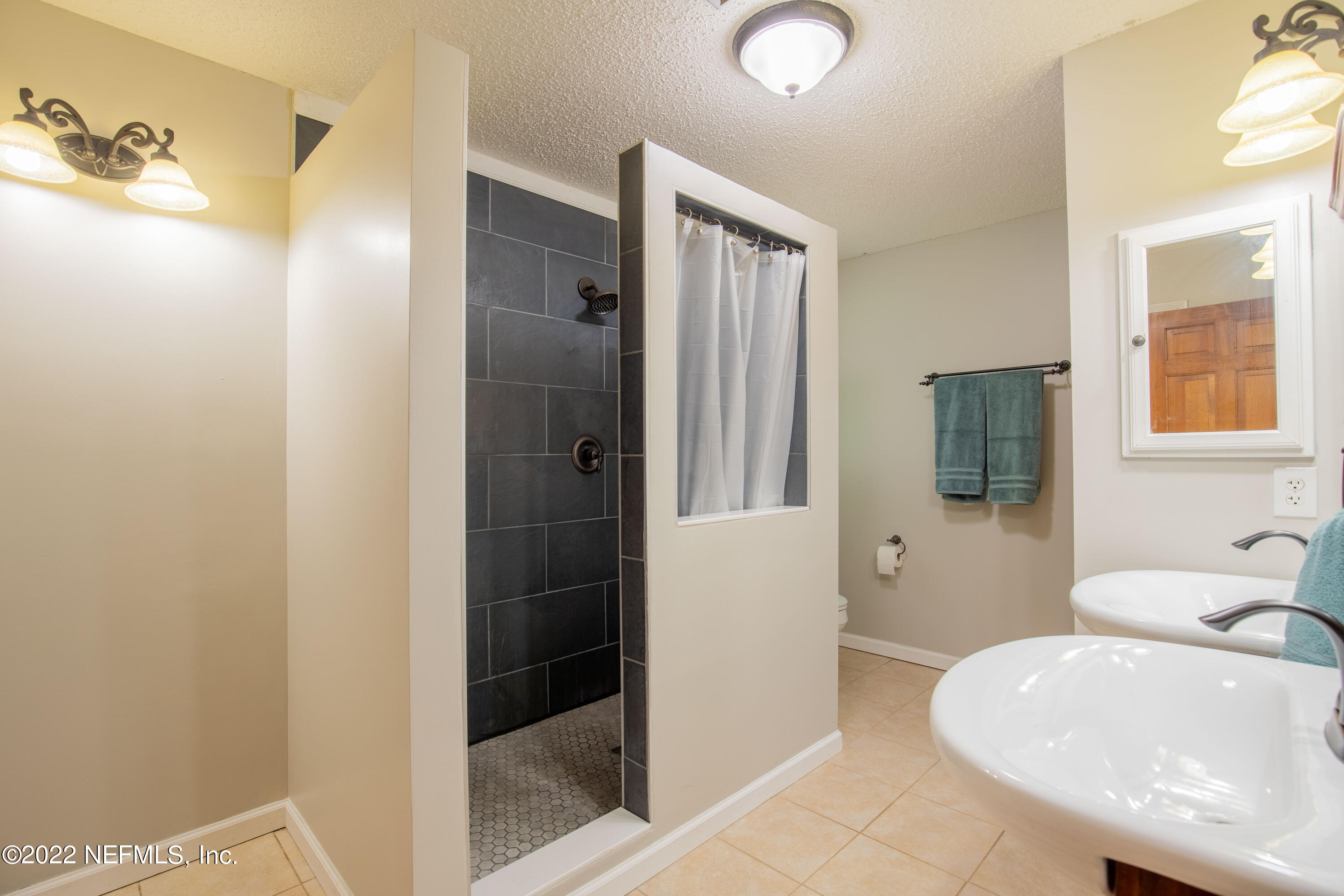 1491 Ropers Road Fleming Island, FL 32003 - Photo 43 of 62 31 Primary Bathroom