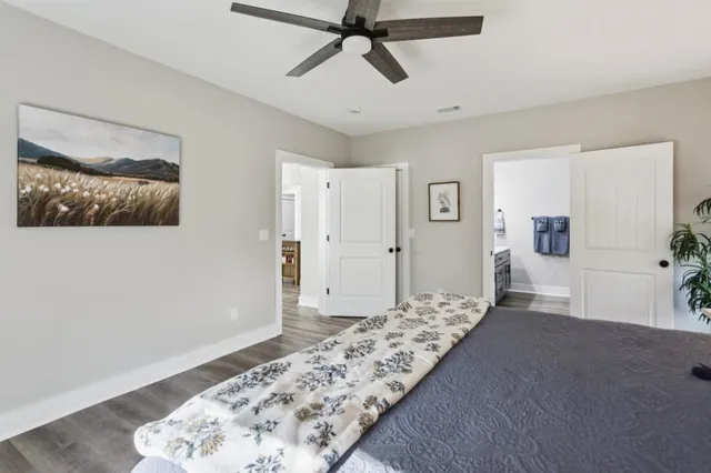 a view of a livingroom with furniture and wooden floor