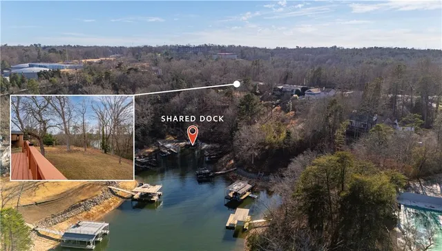 a view of a kitchen with a sink stove cabinets and empty room