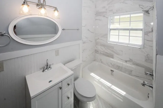 a bathroom with a sink and a toilet