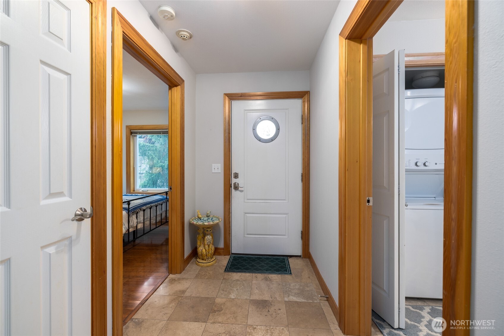 3706 Portage Lane, Unit 102 Anacortes, WA 98221 - Photo 3 of 23 a view of a hallway with a door and entryway