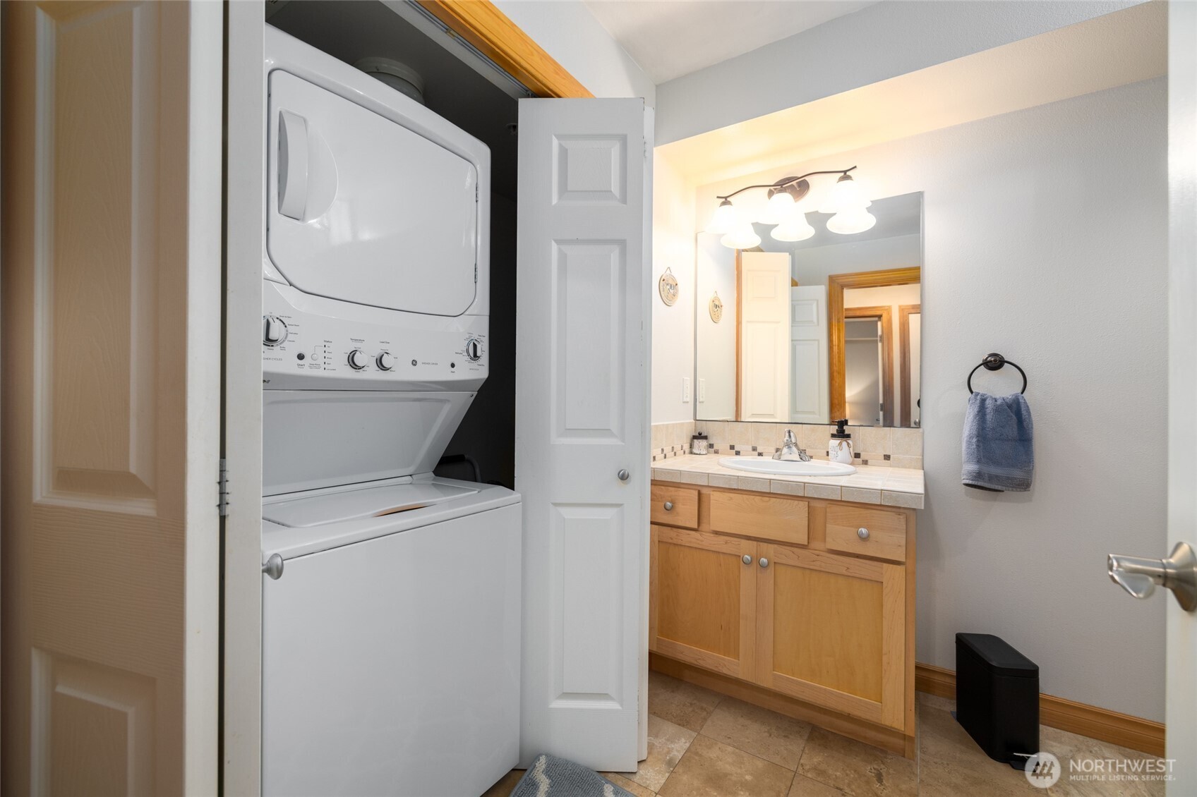 3706 Portage Lane, Unit 102 Anacortes, WA 98221 - Photo 5 of 23 a utility room with dryer and washer