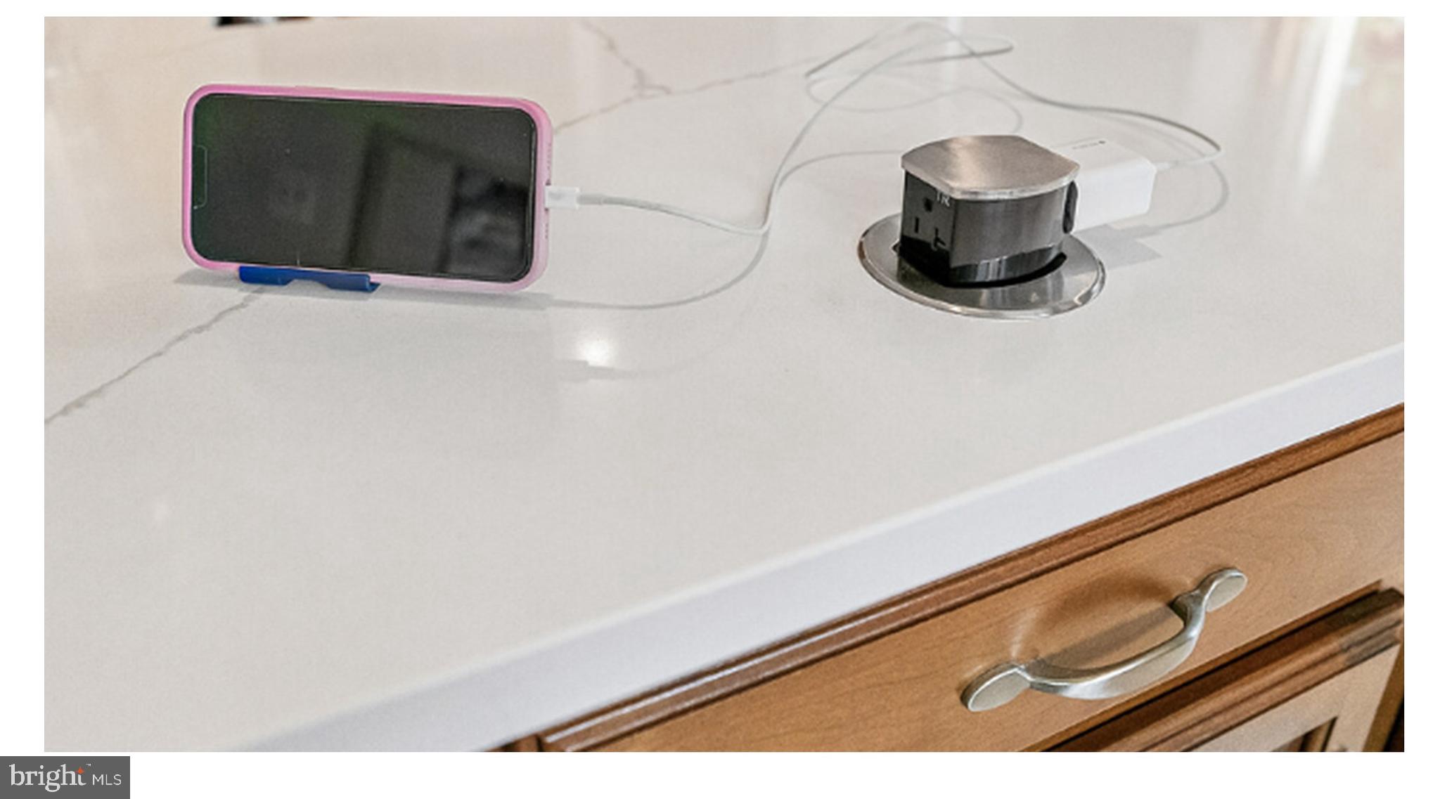 11728 Lovejoy Street Silver Spring, MD 20902 - Photo 15 of 43 Creative counter with custom phone charger!