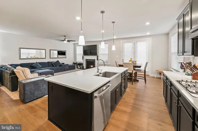 a bedroom with a bed and a dresser in it