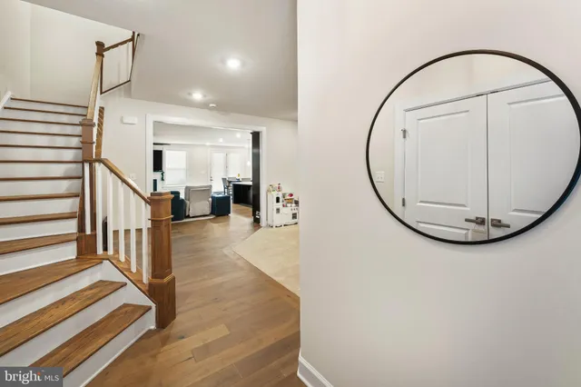 a spacious bedroom with a large bed and a couch