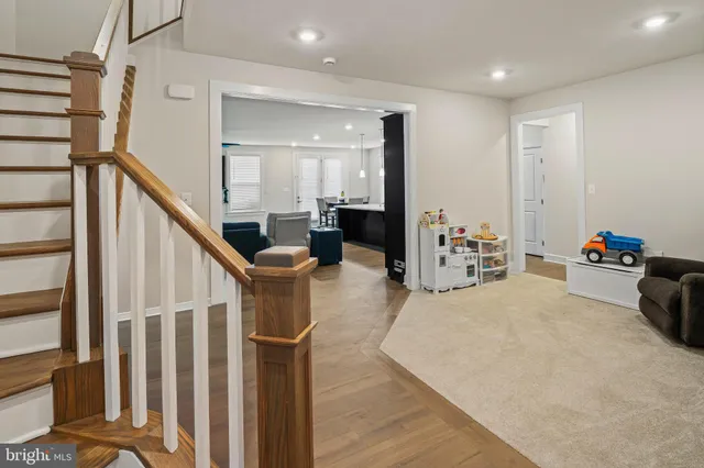 a view of balcony with wooden floor and outdoor seating