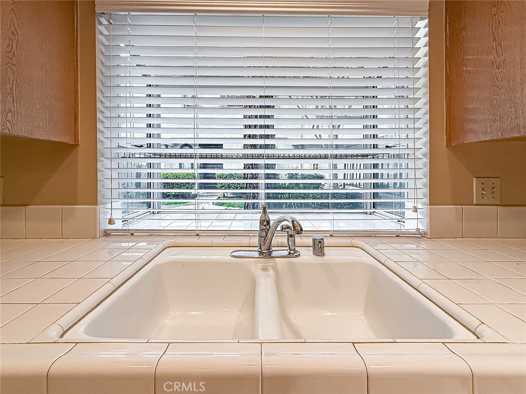 5542 Las Virgenes Road, Unit 97 Calabasas, CA 91302 - Photo 16 of 50 a bathroom with a sink and a window