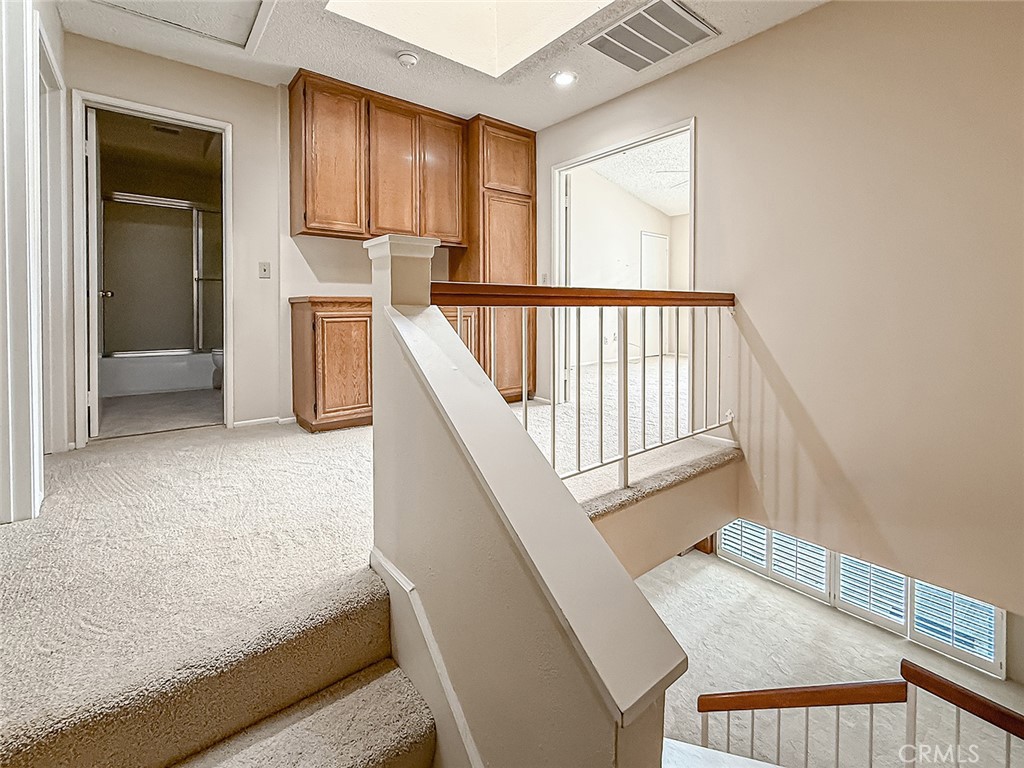 5542 Las Virgenes Road, Unit 97 Calabasas, CA 91302 - Photo 22 of 50 a view of a kitchen with wooden floor and electronic appliances