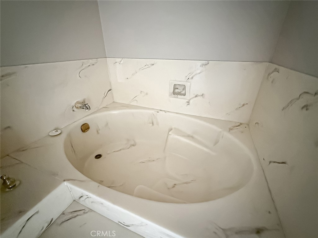 5542 Las Virgenes Road, Unit 97 Calabasas, CA 91302 - Photo 33 of 50 a bathroom with a bathtub
