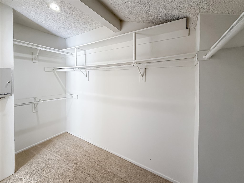 5542 Las Virgenes Road, Unit 97 Calabasas, CA 91302 - Photo 38 of 50 a view of an empty walk in closet