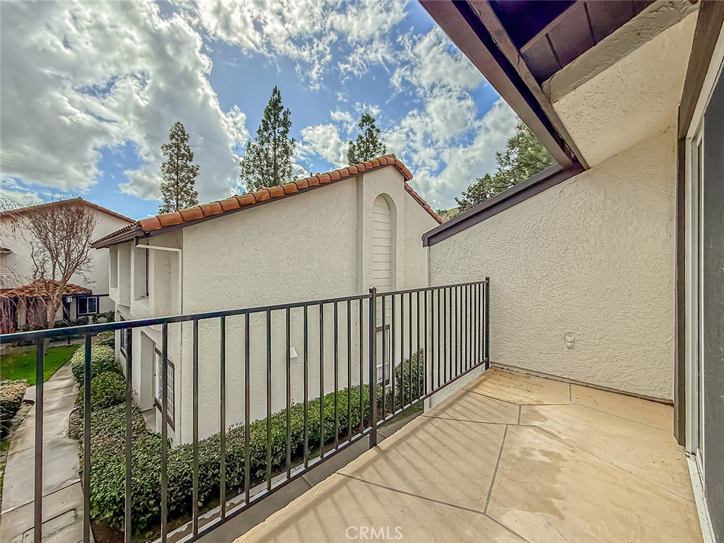 5542 Las Virgenes Road, Unit 97 Calabasas, CA 91302 - Photo 39 of 50 a view of a balcony with wooden floor