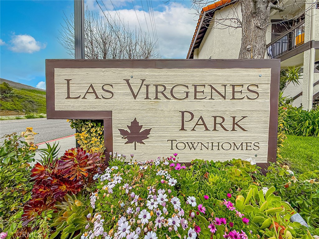 5542 Las Virgenes Road, Unit 97 Calabasas, CA 91302 - Photo 4 of 50 a sign on the side of a building