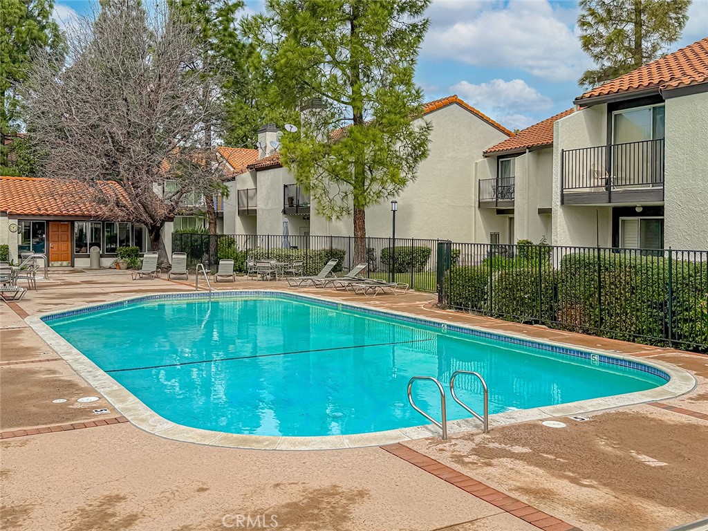 5542 Las Virgenes Road, Unit 97 Calabasas, CA 91302 - Photo 50 of 50 a view of a swimming pool with a patio